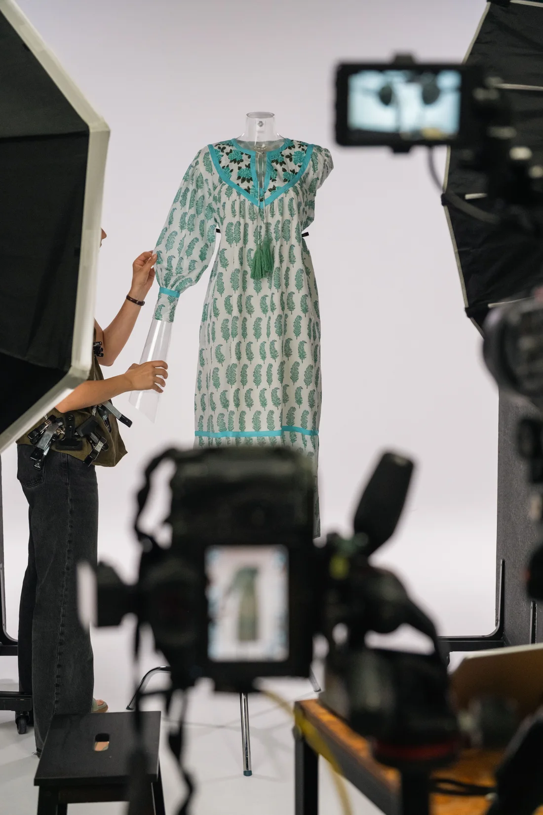 Behind the scenes of e-commerce clothing photography preparation at Comuna studio in Lisbon